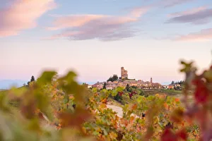Serralunga Dalba Prints: Serralunga d Alba framed by vineyards during autumn sunrise