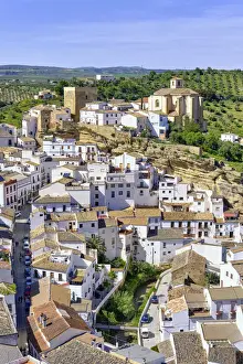 Setenil de las Bodegas with the medieval castle and the church at the hilltop, Andalucia. Spain