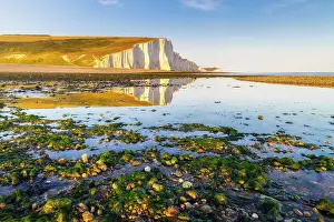 Cuckmere Prints: Seven Sisters reflected on Cuckmere Haven beach at sunset, Sussex, England, United Kingdom