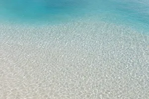 Shallow lagoon by the beach on a tropical island in the South Male Atoll, Maldives Shallow lagoon by the beach on a tropical island in the South Male Atoll, Maldives