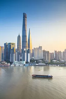 Images Dated 14th November 2014: Shanghai Tower and the Pudong skyline across the Huangpu river, Shanghai, China