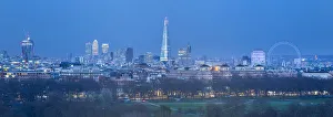 The Shard, Canary Wharf and London Eye above Hyde Park, London, England, UK