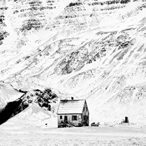 Isolated Prints: Shed and tractor in snowy winter landscape, Snaefellsnes Peninsula, West Iceland