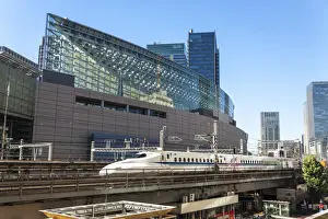 Tracks Prints: Shinkansen Bullet Train on an elevated section of track next to the Tokyo International