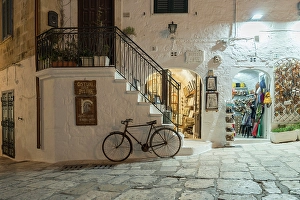 Ostuni Prints: Shop and bicycle, whitewashed walls, Ostuni, Puglia