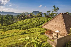 Slopes Prints: Sidemen, Rendang, Karangasem Regency, Bali, Indonesia. Thatched tourist cottages