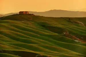 Siena countryside (Crete Senesi) at sunrise in early spring, Tuscany, Italy