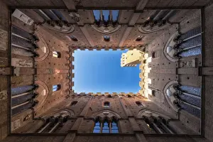 Historic Centre Prints: Siena, Tuscany, Italy, Europe. Classic bottom view of Palazzo Pubblico with Del Mangia s