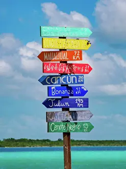 Yucatan Prints: Sign with directions by the Bacalar Lagoon, Bacalar, Quintana Roo State, Mexico