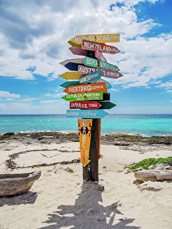 Pole Prints: Sign with directions at Punta Sur, Cozumel Island, Quintana Roo State, Mexico