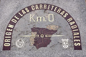 Sign plaque on the street floor marking the kilometre zero from which all the distances