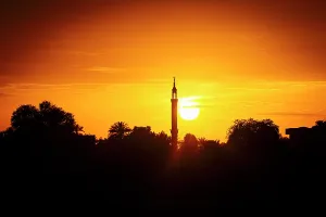 Luxor Prints: Silhouette of a mosque minaret at sunset, Egypt