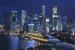 Singapore, city skyline elevated view above the Marina Reservoir, dusk