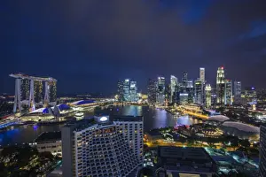 Singapore, city skyline elevated view above the Marina Reservoir, dusk