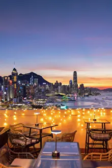 Al Fresco Prints: SipSip Rooftop Bar and skyline of Hong Kong Island at sunset, Hong Kong, China