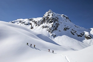 Snowy Mountains Prints: Ski mountainering at Bondone valley, Orobie alps, Lombardy, Italy