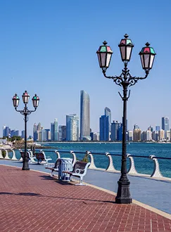Benches Prints: Skyline of the city center seen from Marina, Abu Dhabi, United Arab Emirates
