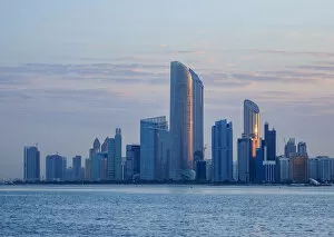 Skyline of the city center at sunrise, Abu Dhabi, United Arab Emirates