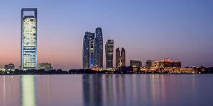 Skyline with Etihad Towers at dawn, Abu Dhabi, United Arab Emirates