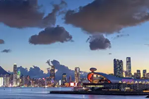 Skyline of Hong Kong Island and Kai Tak Cruise Terminal at dusk, Hong Kong Island, Hong Kong