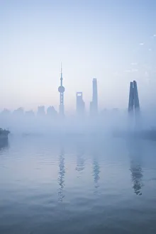 Pudong Prints: Skyline of Pudong on a foggy November morning, Shanghai, China