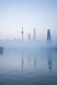 Skyline of Pudong on a foggy November morning, Shanghai, China