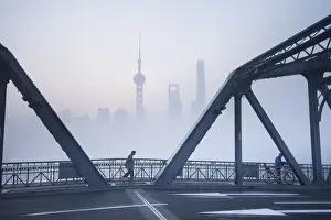 Pudong Prints: Skyline of Pudong & the Waibaidu bridge on a foggy November morning, Shanghai, China