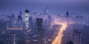 Highway Prints: Skyline of Shanghai from Jing An on a foggy November morning, China