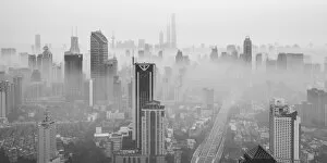 Images Dated 6th November 2016: Skyline of Shanghai from Jing An on a foggy November morning, China