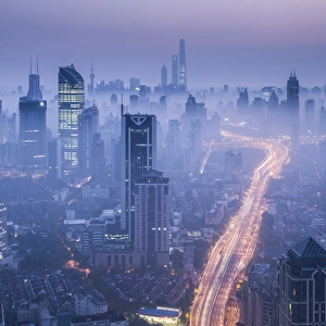 Images Dated 6th November 2016: Skyline of Shanghai from Jing An on a foggy November morning, China