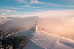 Wintry Prints: Slovenia, Jamnik, Church of St. Primoz with the Kamnik-Savinja Alps beyond, Gorenjska