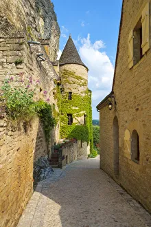 Alleyway Prints: Small alleyway and stone tower in La Roque-Gageac, Dordogne Department, Aquitaine, France