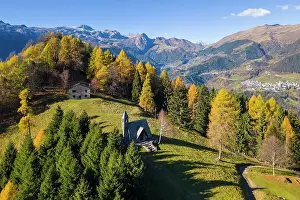Larix Prints: small Alpini church of Azzone and the Presolana massif in autumn
