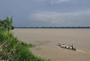 Amazon Gallery: A small boat on the Amazon River, near Puerto Narino, Colombia