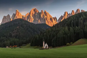 Odle Prints: The small chapel of San Giovanni in Ranui with the Odle mountains. Dolomites, Italy
