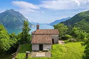 Bergamo District Prints: small church of San Lorenzo dominating Lake Iseo in summer