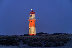 Small or electric lighthouse at south beach at dusk, Borkum, East Frisian Islands, Lower Saxony, Germany