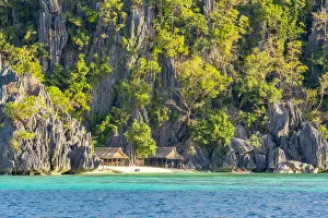 Calamianes Prints: Small huts against dramatic karst cliffs on Coron Island, Palawan, Philippines