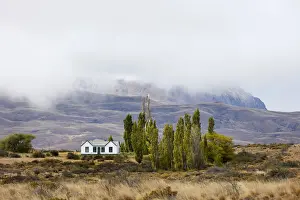 A small traditional house surrounded by the Patagonian landscape