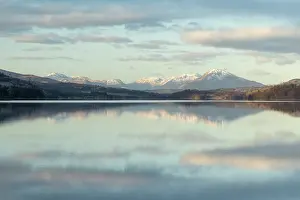 Symmetry Prints: Snow-capped mountains reflected in Loch Garry, Lochaber, Scotland, February 2025