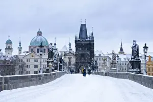 Ceska Republika Prints: Snow-covered Charles Bridge and Old Town Bridge Tower in winter, Prague, Bohemia