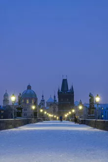 Images Dated 20th January 2021: Snow-covered Charles Bridge at twilight in winter, Prague, Bohemia, Czech Republic