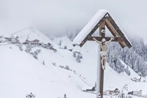 Jesus Prints: Snow-covered grave crosses in the cemetery in Rein in Tauferns