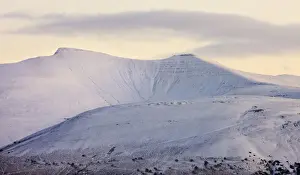 Snow covered Pen y Fan and Corn Du mountains in the Brecon Beacons National Park, Powys, Wales, UK. Winter (January) 2010