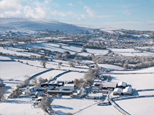 Dartmoor Prints: Snow covered rural farm in Dartmoor National Park, Devon, England. Autumn (November) 2024