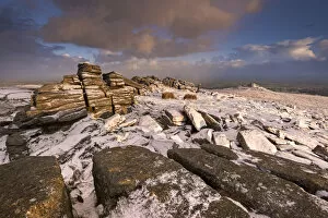 Snow dusted granite outcrops on Belstone Tor, Dartmoor, Devon, England