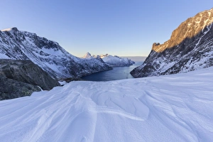 Snow molded by the wind near the Devensattel, a mountain pass that overlooks the Oyfjorden Snow molded by the wind near the Devensattel, a mountain pass that overlooks the Oyfjorden