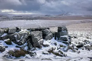 Moorland Prints: Snow on the moorland and granite outcrops at Rowtor in Dartmoor National Park
