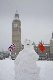 Images Dated 4th March 2009: Snowman infront of Houses of Parliament and Big Ben, Westminster, London, England, UK