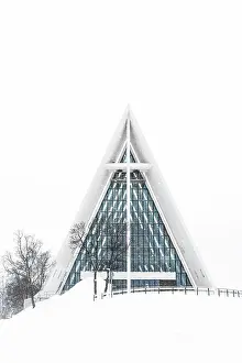 Nordland County Prints: Snowy facade of the Arctic Cathedral decorated with glass windows, Tromso, Norway